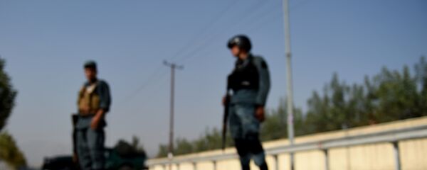 Афганский полицейский на месте взрыва, архивное фото Афганский полицейский на месте взрыва, архивное фото - Sputnik Таджикистан