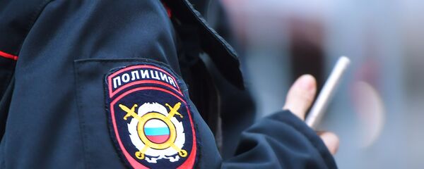 Эмблема на форме сотрудника полиции, архивное фото - Sputnik Тоҷикистон