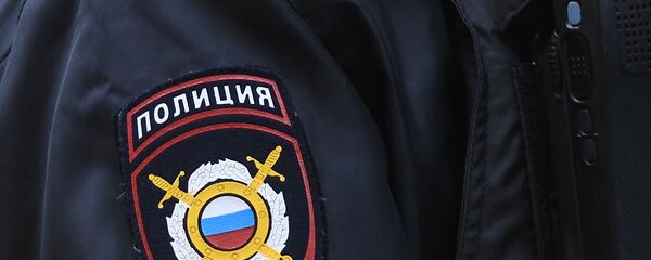 Эмблема на форме сотрудника полиции, архивное фото - Sputnik Тоҷикистон