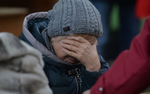 Родственница одного из пропавших без вести при пожаре в торговом центре «Зимняя вишня» в Кемерово - Sputnik Тоҷикистон