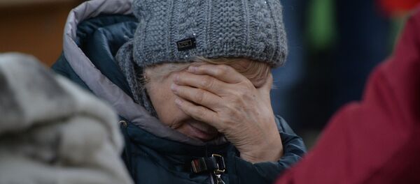 Родственница одного из пропавших без вести при пожаре в торговом центре «Зимняя вишня» в Кемерово - Sputnik Тоҷикистон