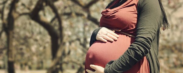 Беременная женщина, архивное фото - Sputnik Таджикистан