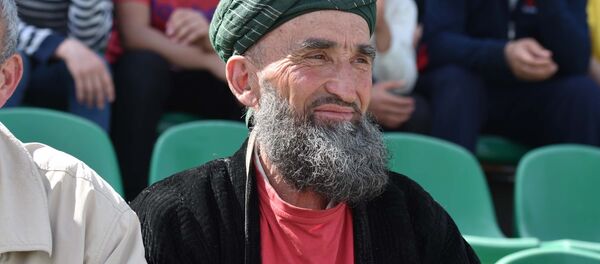 Болельщик на стадионе, архивное фото - Sputnik Тоҷикистон