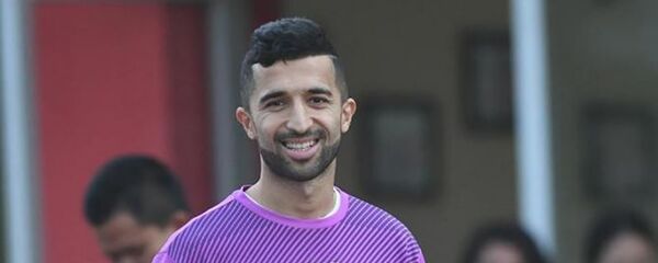 Нападающий сборной Таджикистана по футболу Манучехр Джалилов, архивное фото - Sputnik Таджикистан