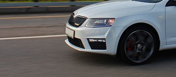 Автомобиль на дороге, архивное фото Автомобиль на дороге, архивное фото - Sputnik Тоҷикистон