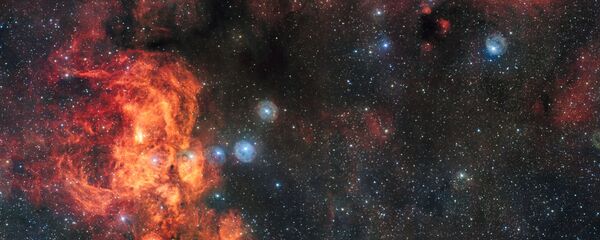 Снимок туманности Кошачья Лапа и Омар, сделанный на широкоугольном телескопе, входящем в комплекс VLT - Sputnik Таджикистан