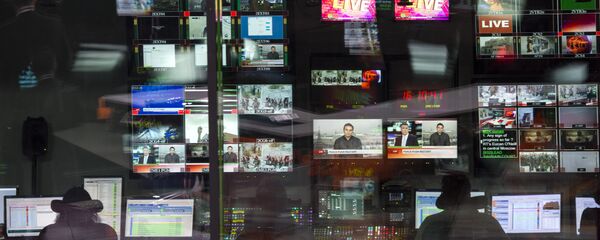 Аппаратная ньюсрума телеканала Russia Today на английском языке, архивное фото - Sputnik Таджикистан