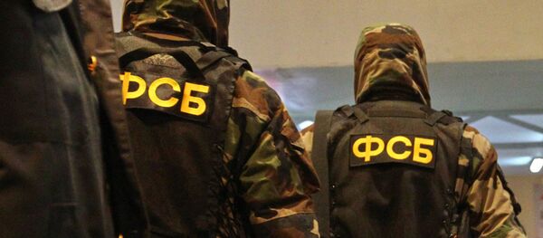 Сотрудники ФСБ, архивное фото - Sputnik Тоҷикистон