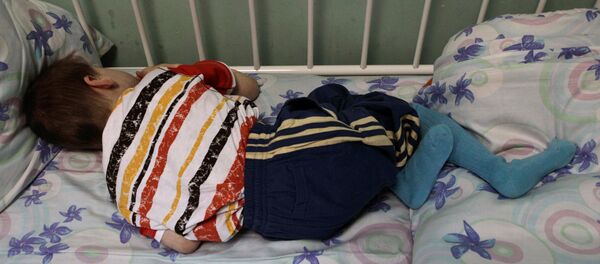 Ребенок в детском доме-интернате, архивное фото - Sputnik Тоҷикистон