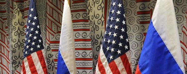 Флаги России и США - Sputnik Тоҷикистон