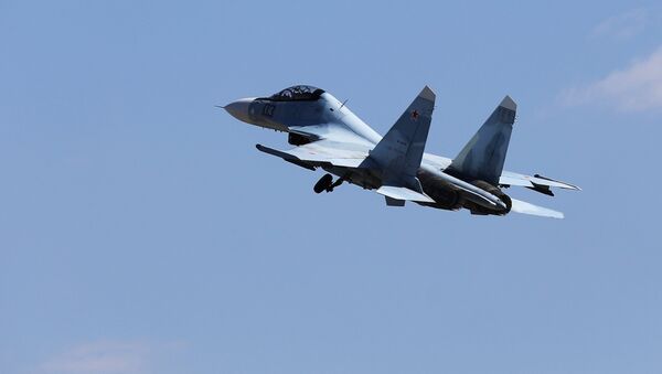 Многоцелевой истребитель Су-30, архивное фото - Sputnik Тоҷикистон