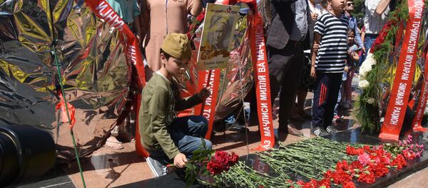 Акция Бессмертный полк в Душанбе Акция Бессмертный полк в Душанбе - Sputnik Таджикистан