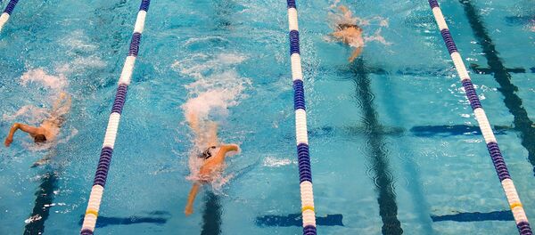 Соревнования пловцов в бассейне, архивное фото Соревнования пловцов в бассейне, архивное фото - Sputnik Тоҷикистон