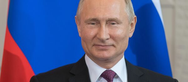 Президент России Владимир Путин, архивное фото - Sputnik Тоҷикистон