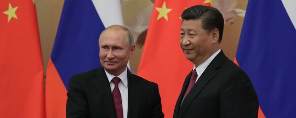 Президент РФ Владимир Путин и председатель КНР Си Цзиньпин - Sputnik Тоҷикистон