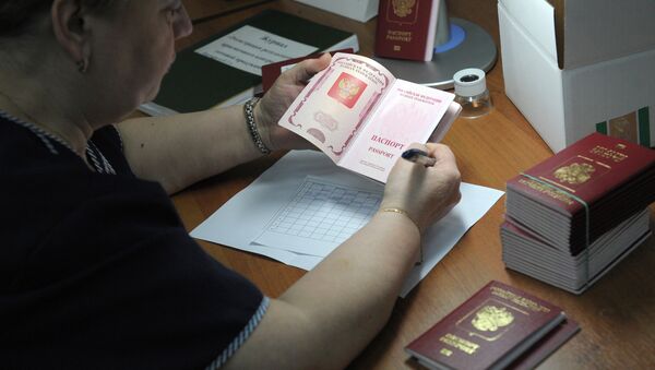 Биометрический заграничный паспорт гражданина РФ - Sputnik Тоҷикистон