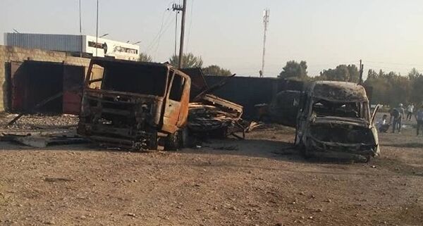 Последствия взрыва автозаправочной станции в Лейлекском районе - Sputnik Таджикистан