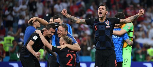 Игроки сборной Хорватии радуются победе, архивное фото - Sputnik Таджикистан