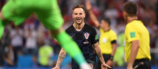 Иван Ракитич радуется над победой, архивное фото - Sputnik Тоҷикистон