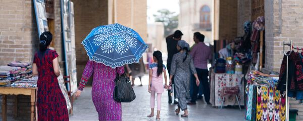 На улице города Бухара, архивное фото На улице города Бухара, архивное фото - Sputnik Таджикистан