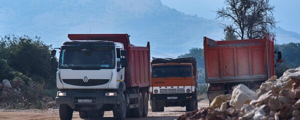 КамАЗ, акс аз бойгонӣ - Sputnik Тоҷикистон