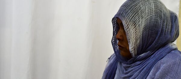 Мусульманская женщина, архивное фото Мусульманская женщина, архивное фото - Sputnik Таджикистан