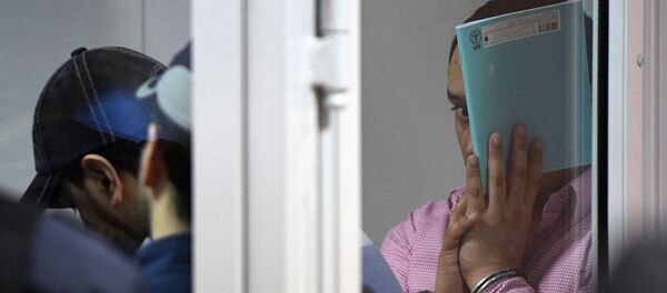 Члены банды ГТА/GTA, обвиняемые в серии убийств водителей, в Мособлсуде во время оглашения приговора - Sputnik Таджикистан