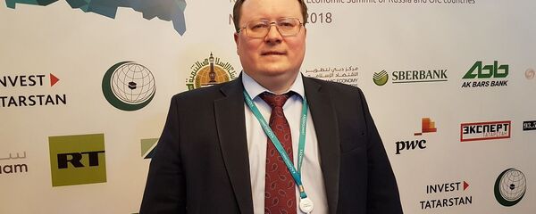 Александр Разуваев директор аналитического департамента Альпари - Sputnik Тоҷикистон