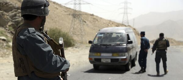 Офицер полиции в Афганистане, архивное фото - Sputnik Тоҷикистон