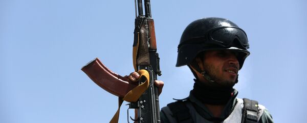 Полицейский в Афганистане, архивное фото - Sputnik Таджикистан