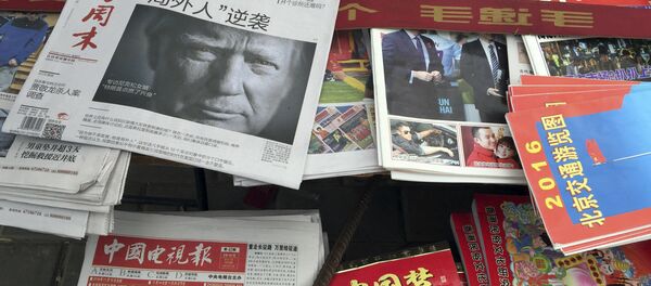 Газеты на китайском языке, архивное фото Газеты на китайском языке, архивное фото - Sputnik Таджикистан