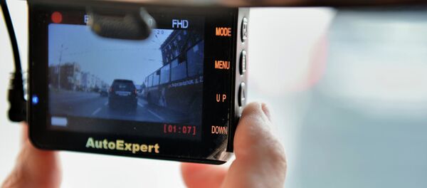 Видеорегистратор в автомобиле, архивное фото - Sputnik Таджикистан