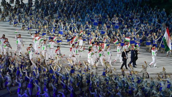 Сборная Таджикистана на церемонии открытия летних Азиатских игр 2018 - Sputnik Тоҷикистон