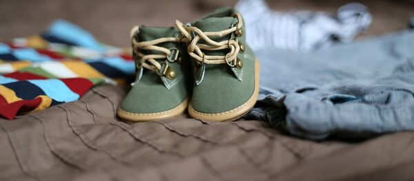 Туфли для малыша, архивное фото - Sputnik Таджикистан