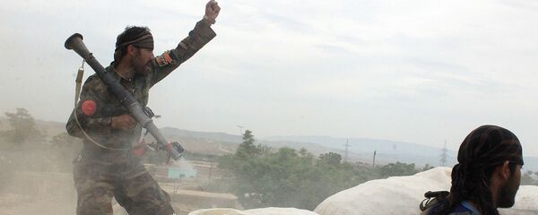 Военнослужащие афганской армии во время столкновения с талибами*, архивное фото Военнослужащие афганской армии во время столкновения с талибами*, архивное фото - Sputnik Тоҷикистон