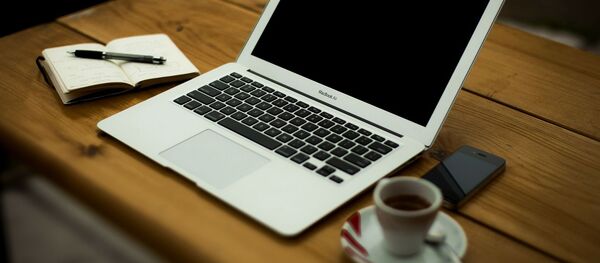 Ноутбук, архивное фото - Sputnik Таджикистан