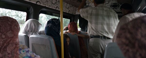 Пассажиры в маршрутке, архивное фото - Sputnik Тоҷикистон