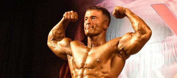 Чемпион по бодибилдингу Фирдавс Дустов Чемпион по бодибилдингу Фирдавс Дустов - Sputnik Таджикистан