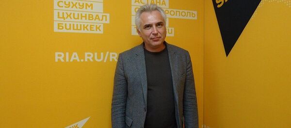 Первый заместитель декана факультета мировой экономики и мировой политики Высшей школы экономики Игорь Ковалев - Sputnik Таджикистан