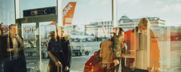 Пассажиры в аэропорту, архивное фото - Sputnik Таджикистан