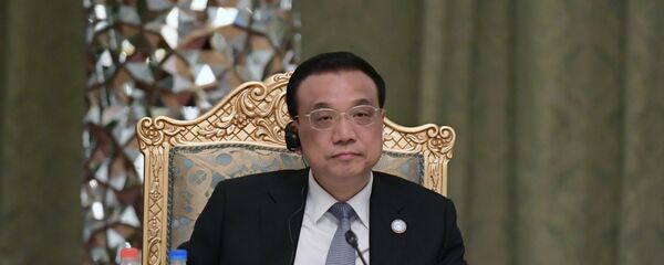 Премьер Госсовета КНР Ли Кэцян - Sputnik Таджикистан