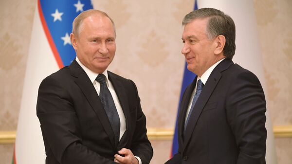  Президент РФ Владимир Путин и президент Узбекистана Шавкат Мирзиёев - Sputnik Таджикистан
