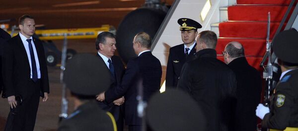 Президент России Владимир Путин и глава Узбекистана Шавкат Мирзиёев - Sputnik Таджикистан