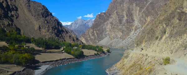 Река вдоль границы с Афганистаном, архивное фото - Sputnik Тоҷикистон