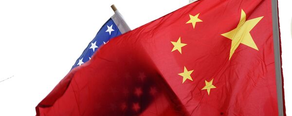 Флаги США и Китая, архивное фото - Sputnik Таджикистан