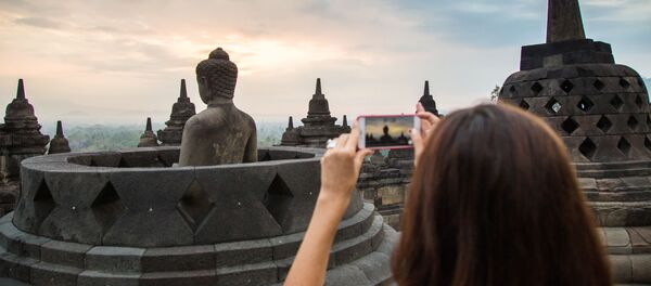 Буддийский храмовый комплекс Борободур Буддийский храмовый комплекс Борободур - Sputnik Таджикистан