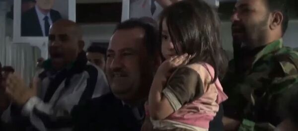 Освобождение женщин и детей,  взятых в заложники террористами в Сирии - Sputnik Таджикистан