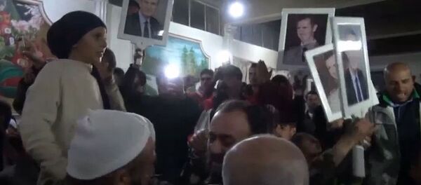 Освобождение женщин и детей,  взятых в заложники террористами в Сирии - Sputnik Таджикистан