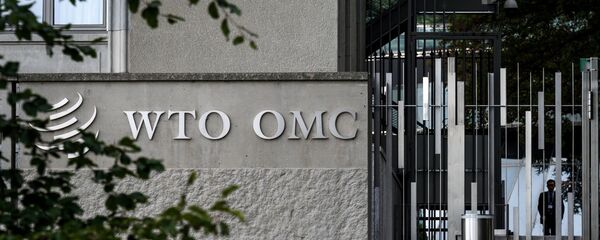 Логотип на здании штаб квартиры WTO, архивное фото - Sputnik Таджикистан