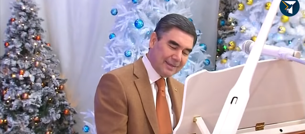 Президент Туркменистана спел по-немецки - Sputnik Тоҷикистон